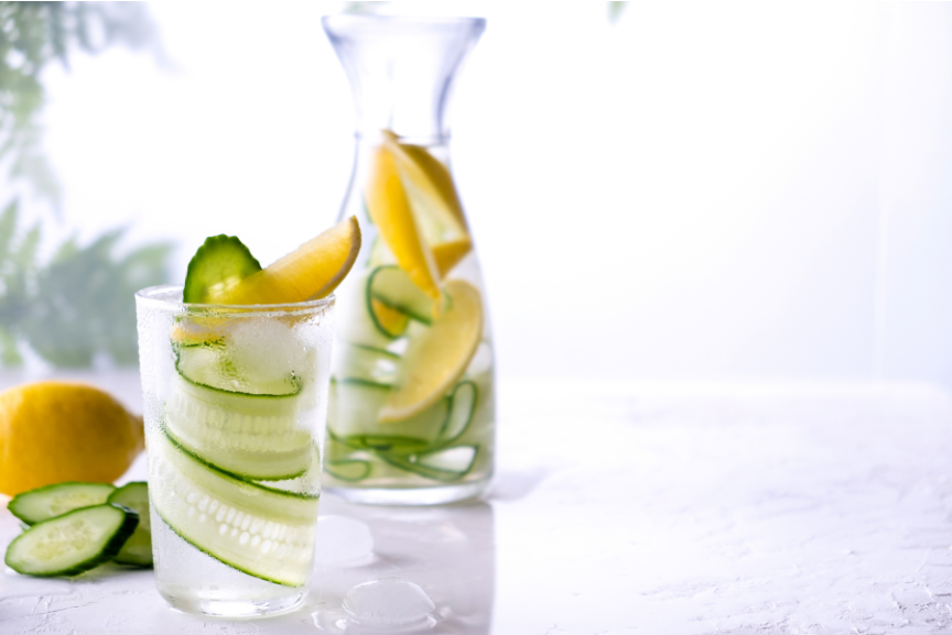 Water carafes with lemon and cucumber.