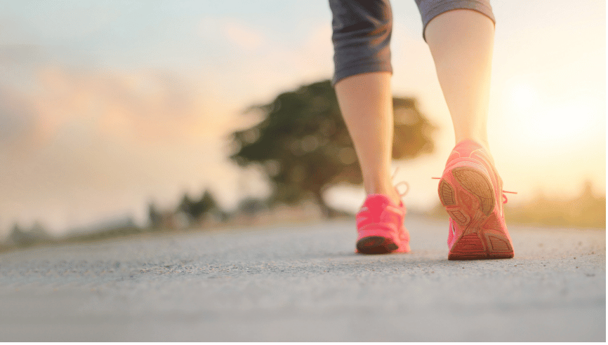 A women doing a morning walking workout.