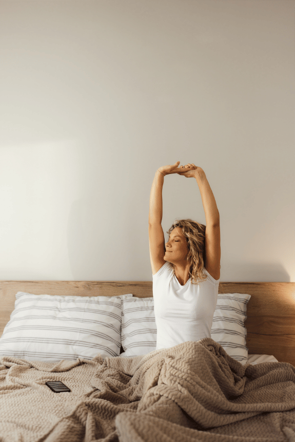 Woman waking up after a good rest.