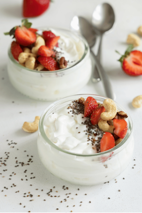 Yogurt dishes showing how to hit protein goals.