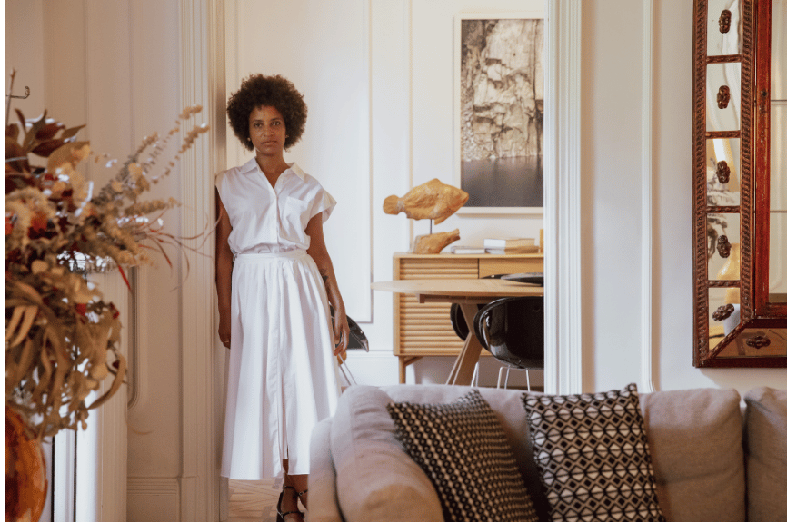 An ambitious woman in the beautiful home she manifested.