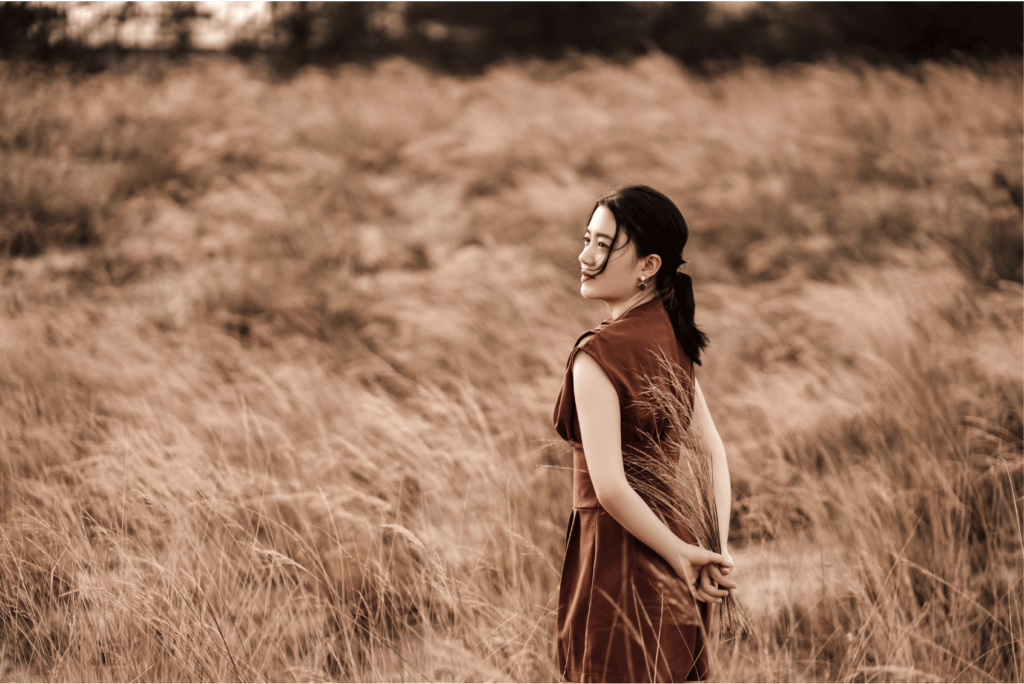 A woman experiencing a moment of soulful refections.