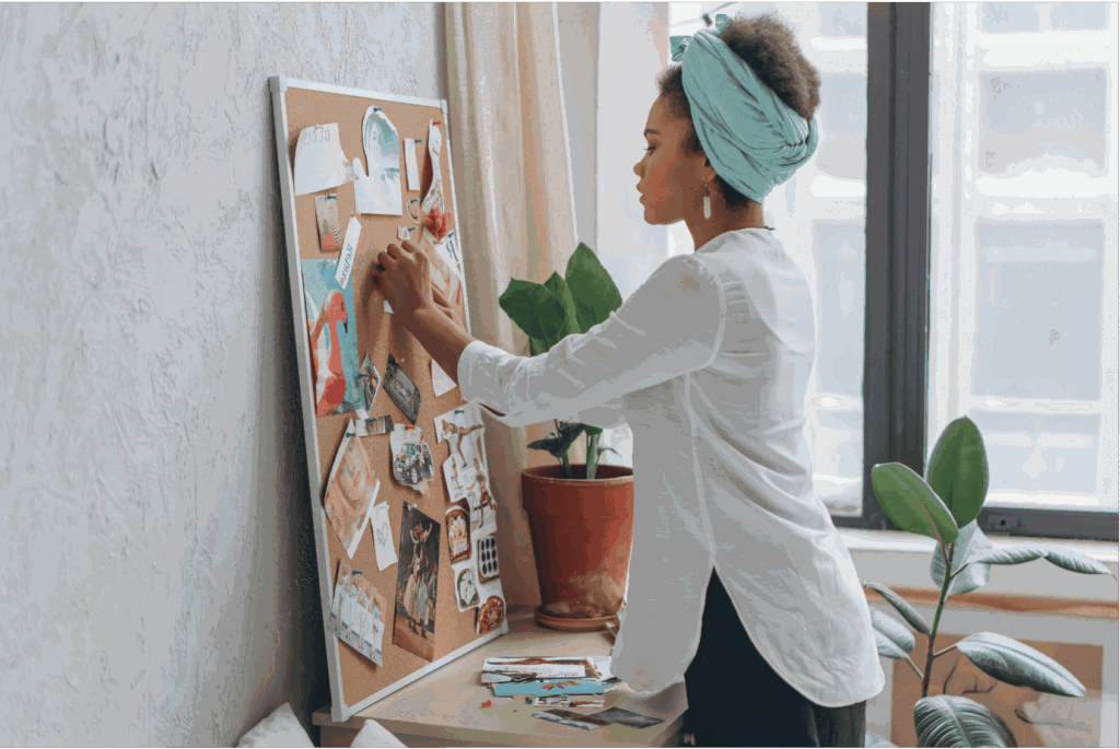 Woman envisioning after a vision board party.