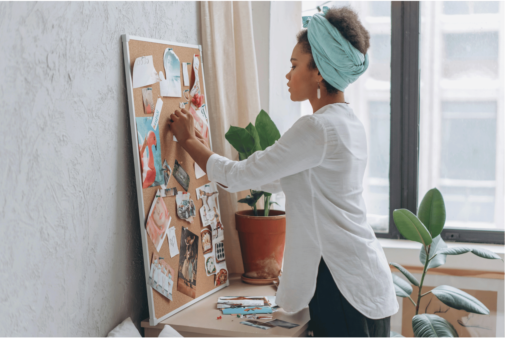 Woman envisioning after a vision board party.