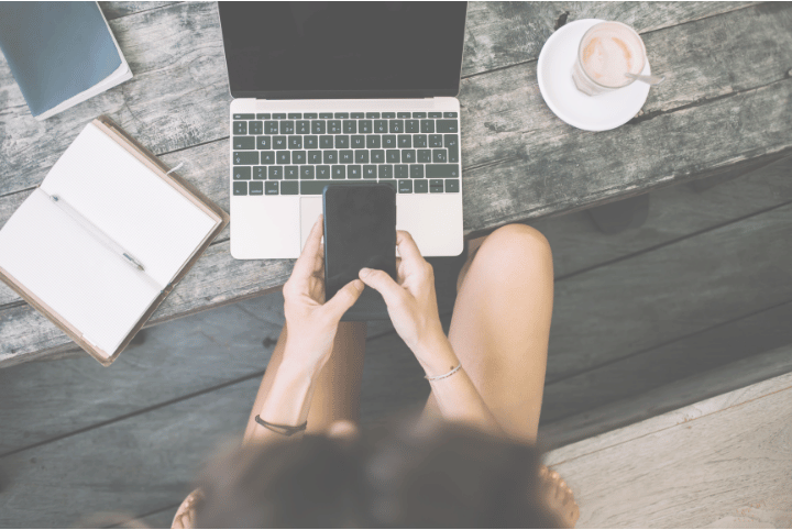 Woman procrastinating due to subconscious fear of success.